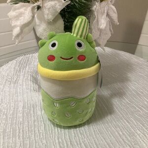 Green and Yellow Stuffed Animal Toy